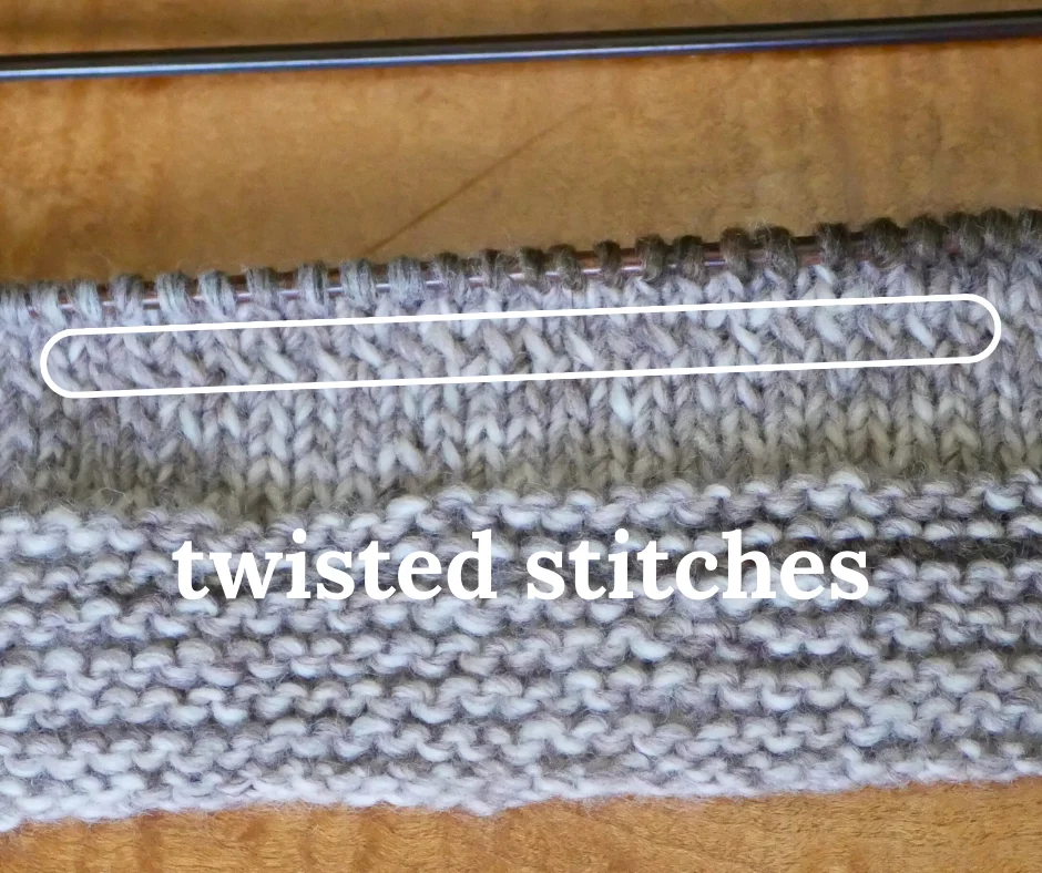 Closeup image of knitted fabric with one row of stitches twisted. Twisted stitches are circled and labeled twisted stitches. 