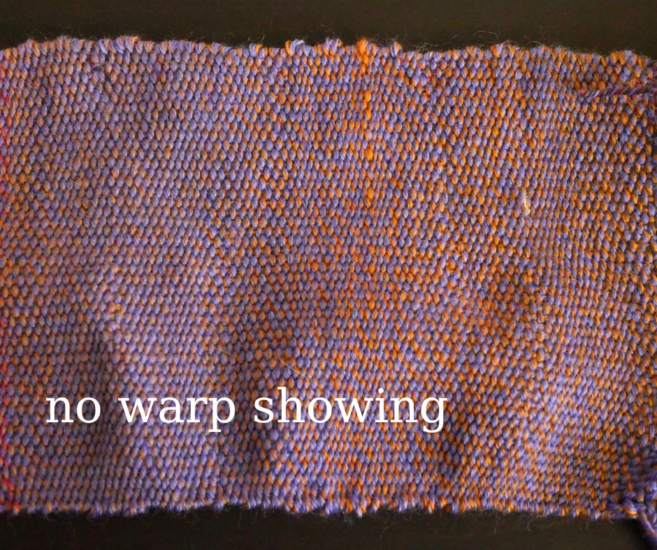 Close up image of fabric that has the weft so close together that no warp is showing. 